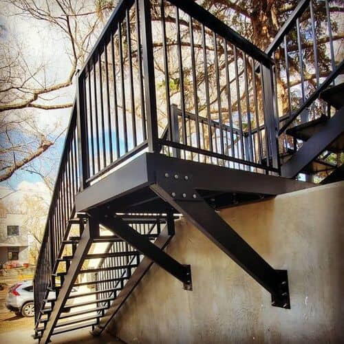 Custom metal staircases designed and fabricated by Proshield Metal Works in Edmonton.